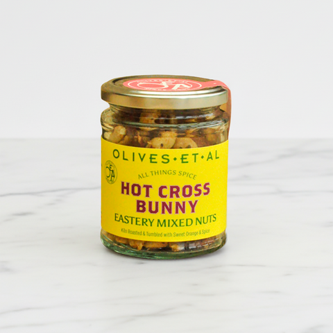 Jar of 'Hot Cross Bunny' mixed nuts with a yellow label on a white background