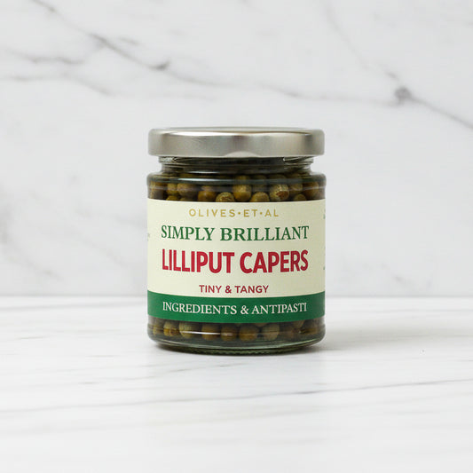 Jar of Simply Brilliant Lilliput Capers on a white background