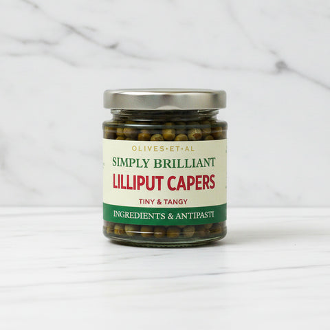 Jar of Simply Brilliant Lilliput Capers on a white background