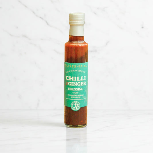 Bottle of Chilli Ginger dressing on a white background